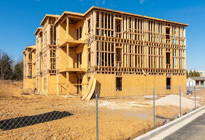 a panoramic view of temporary chain link fences on a construction site, separating work zones in Worth, IL